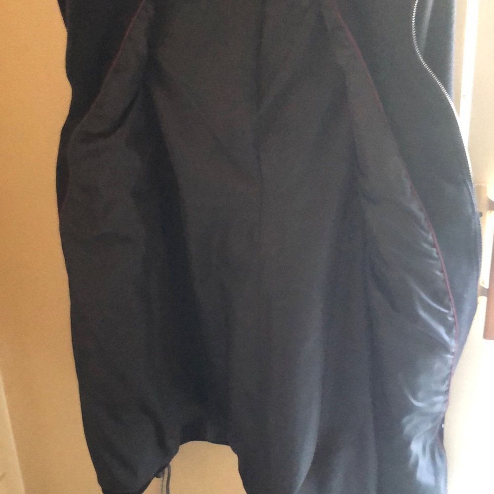 Woman’s black wool coat.